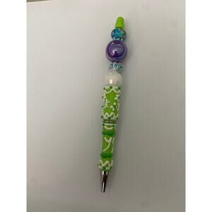 Lime green 3-D floral beaded pen with bright blue rhinestone ￼